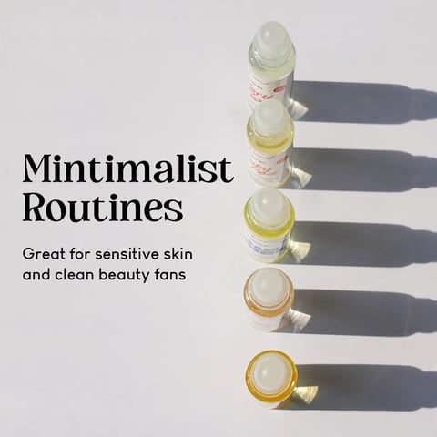 Minimalist skincare routine with five stacked jars of serums and creams on white background with shadows